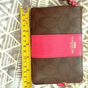 Coach brown/pink wristlet with card holder